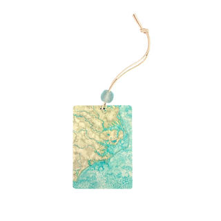 We are in love with Laura Lobdell's designs from Printed Hues and when she presented this ornament to add to our collection, it was a resounding YES! Covering the Crystal Coast of North Carolina from the Outer Banks down past Wilmington, your favorite beach is sure to be covered! Comes with a muslin pouch for gifting, this can be hung the whole year through! 