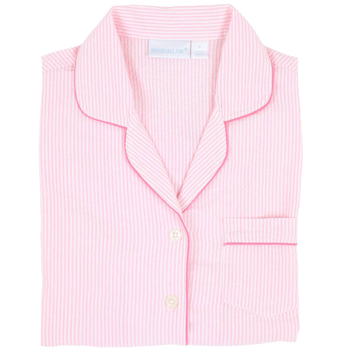Pink striped pajama top with white collar on a white background