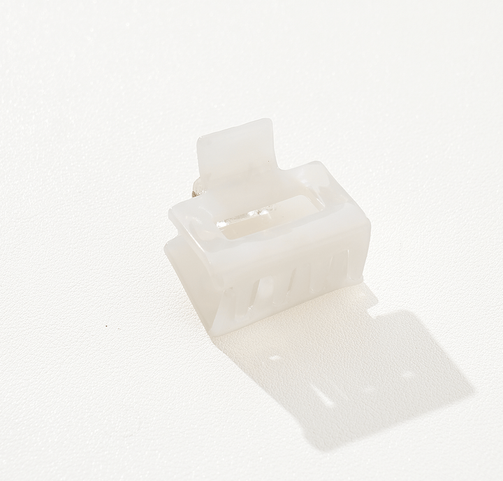 White ceramic vase on a white background