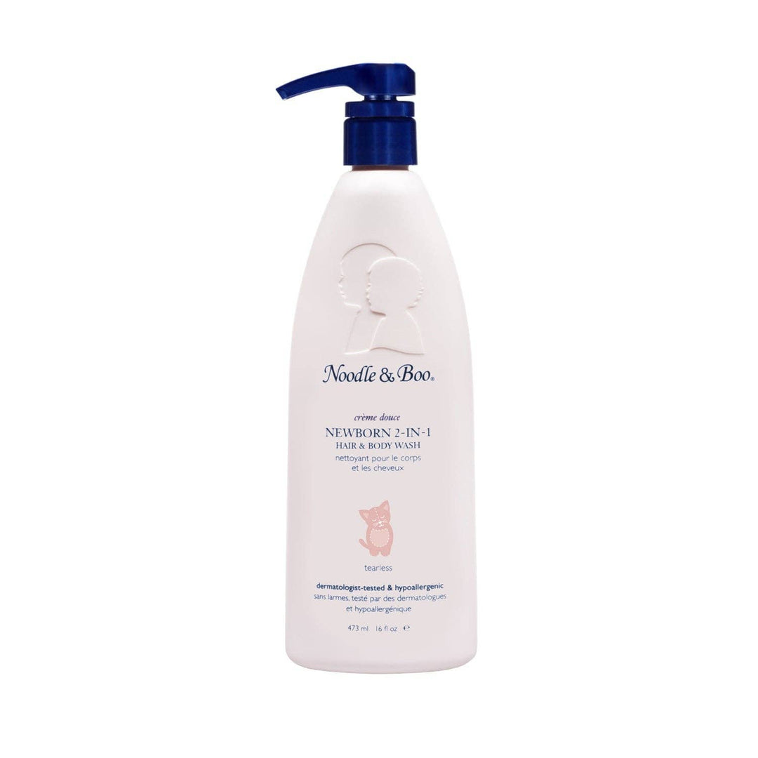 A bottle of Noodle & Boo Soothing Body Wash on a solid white background. The bottle is white with a dark blue pump dispenser and features a small yellow rubber duck graphic on the front label.