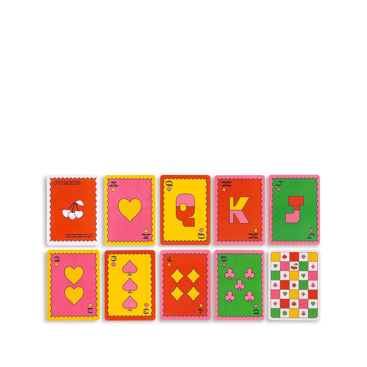 Set of colorful playing cards with various symbols on a white background