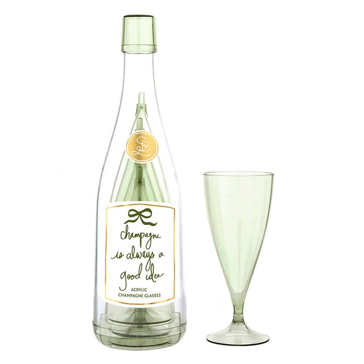 Green champagne bottle and glass with a label on a white background