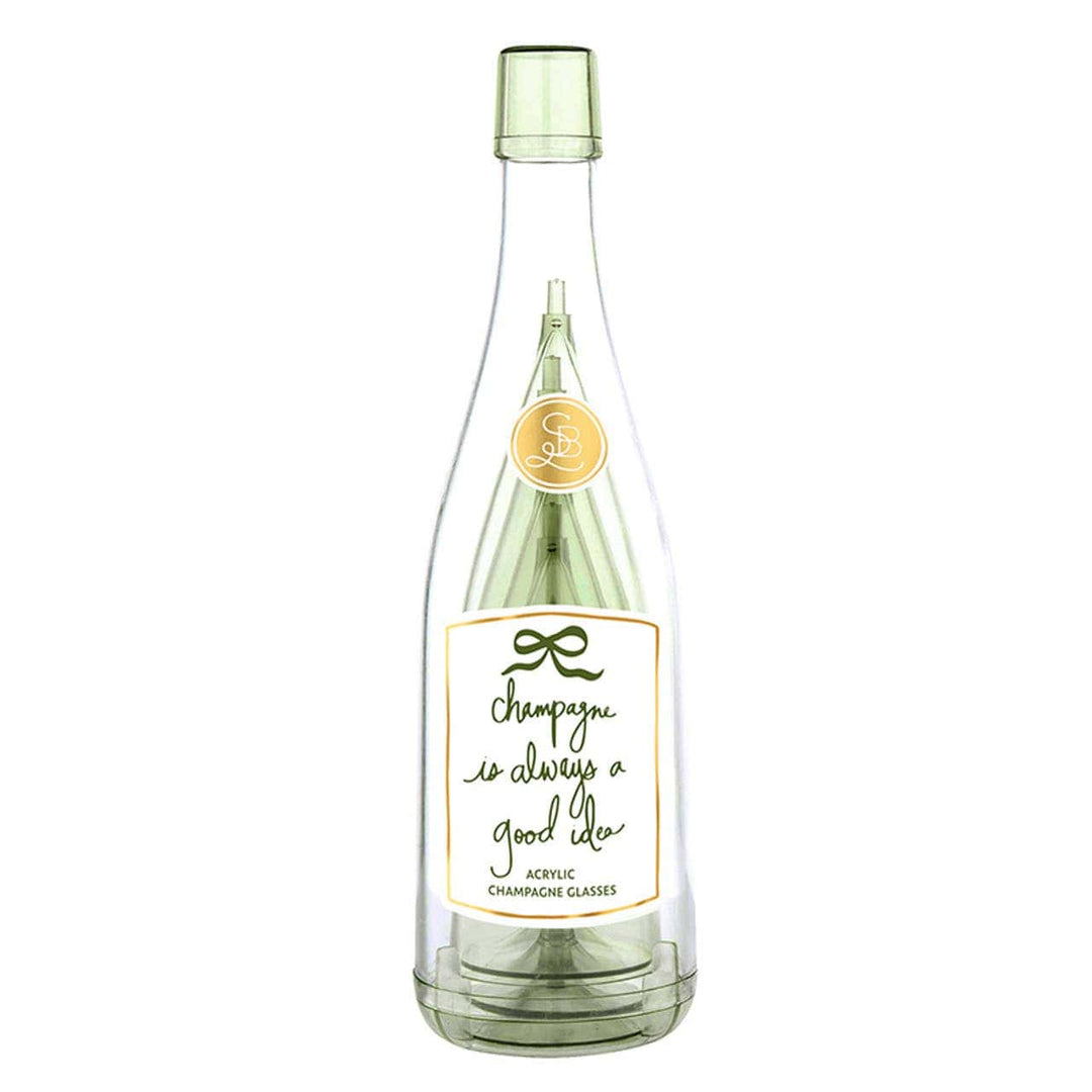 Clear acrylic champagne glass bottle with a label on a white background