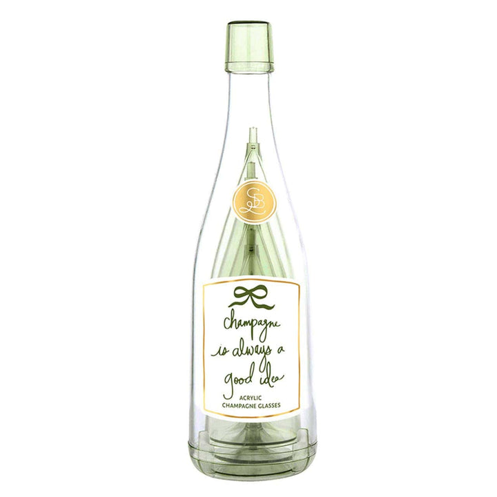 Clear acrylic champagne glass bottle with a label on a white background