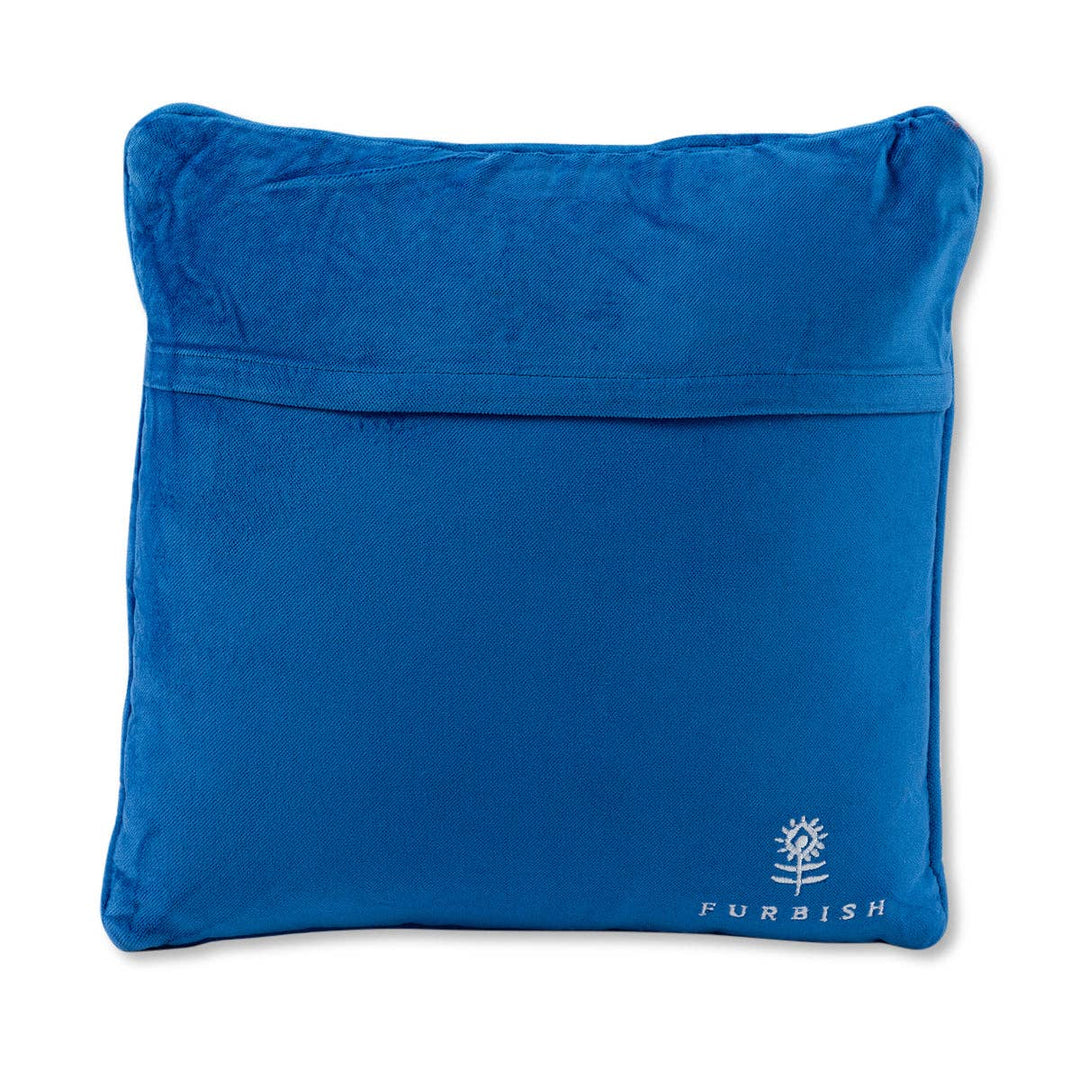 Blue pillow with 'Furbish' logo on a white background