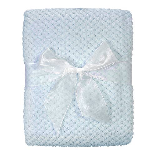 Light blue textured blanket with a white bow on a white background
