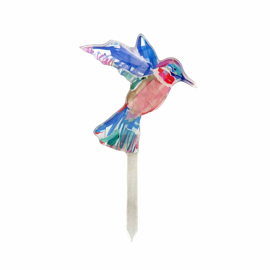 Colorful hummingbird-shaped garden stake on a white background