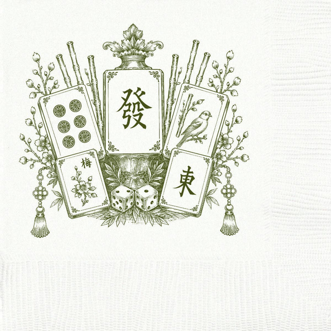 A white textured paper napkin featuring a green vintage-style illustration of mahjong tiles, dice, and floral decorative elements.