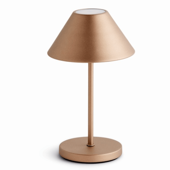Gold table lamp on a white background