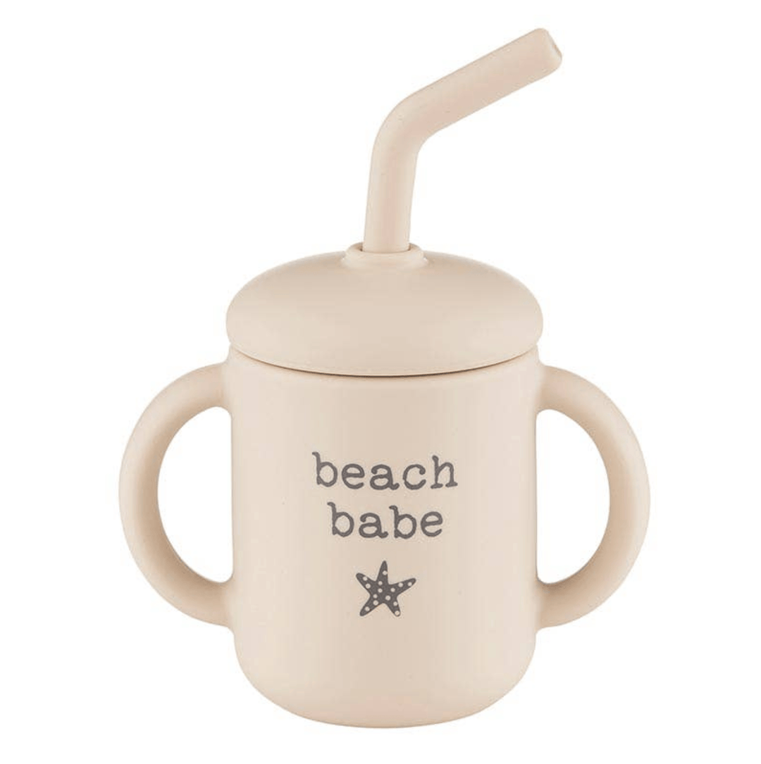 Beige sippy cup with straw and 'beach babe' text on a white background