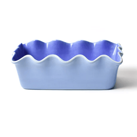 Iris blue ceramic loaf pan on white background. 