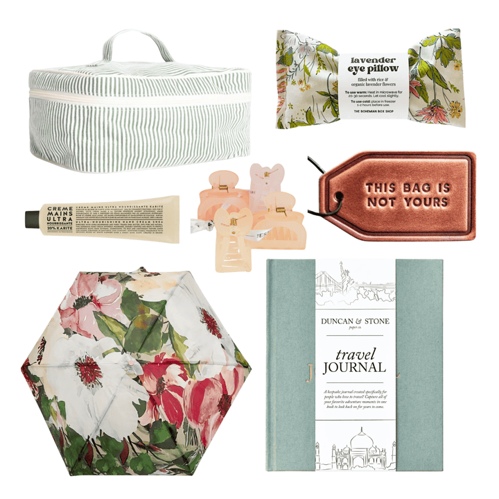 Collage of various items including a floral umbrella, travel journal, and decorative objects on a white background.