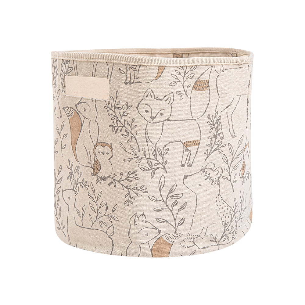 A fabric storage bin with a woodland animal print featuring foxes, a deer, an owl, and a squirrel in brown and beige tones on a cream background, with a fabric handle on the side.