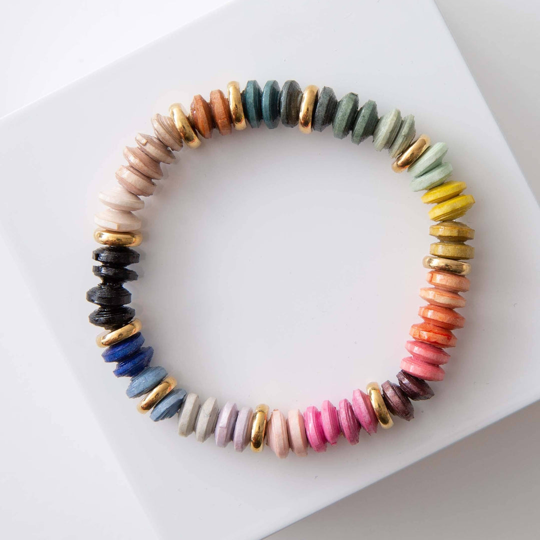 Multicolored beaded bracelet on a white surface