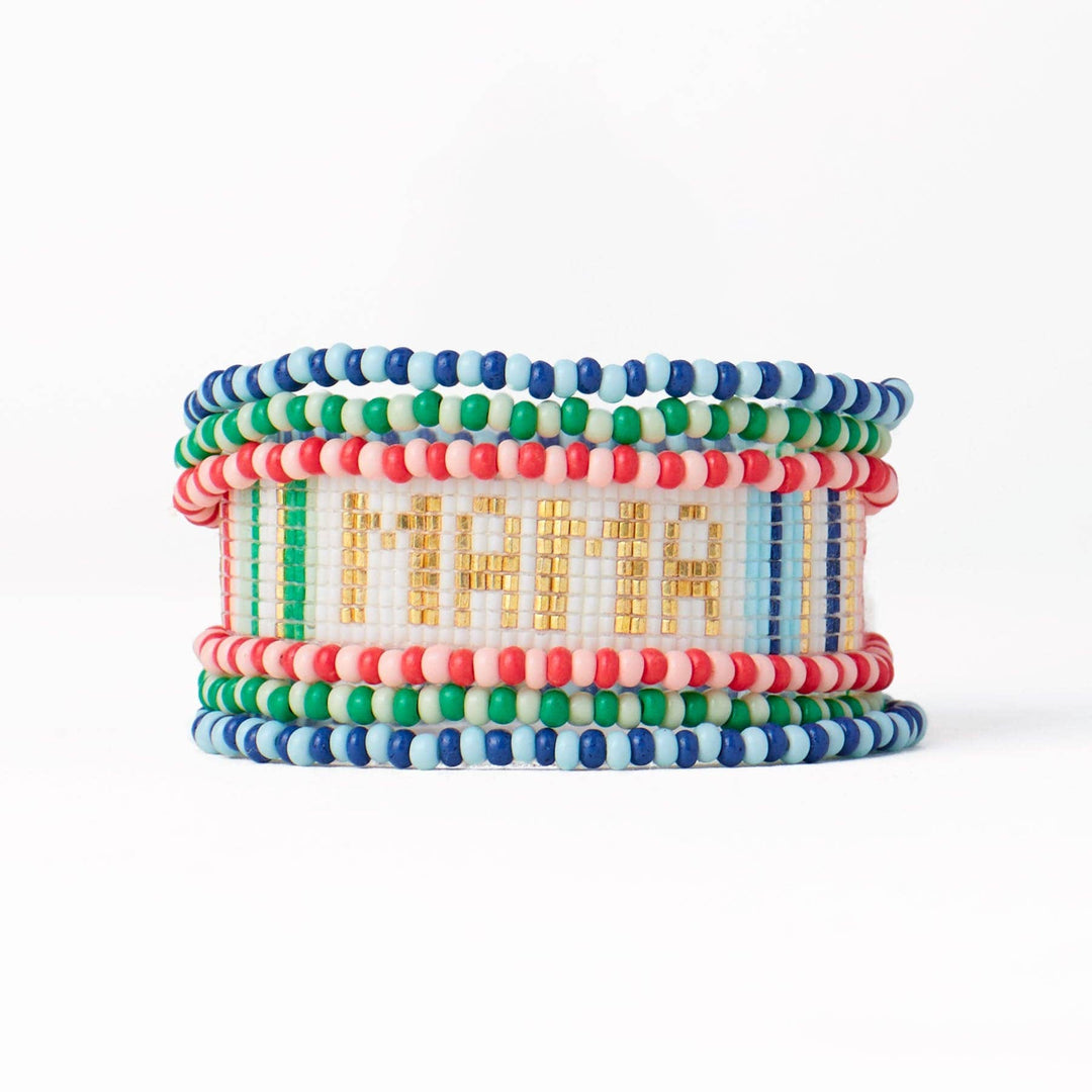 Stack of colorful beaded bracelets with 'MAMA' on a white background