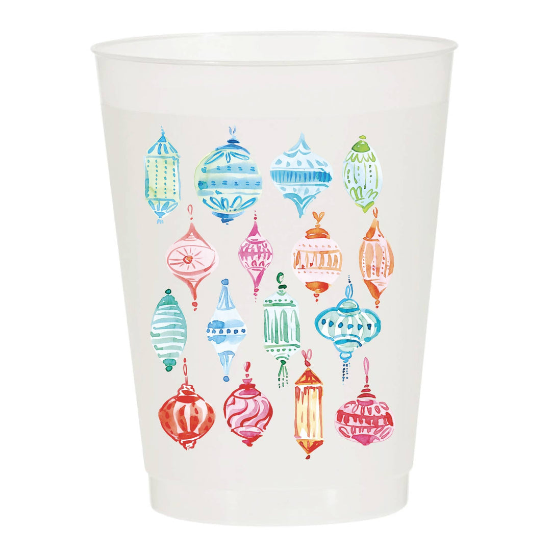 White cup with colorful decorative elements on a white background
