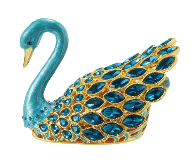 Add a touch of graceful elegance to any room setting with this gold-finished Swan-Shaped Trinket Box, crafted in smooth enamel and adorned with blue highlights and shimmering glass jewels. The sculptural form evokes timeless charm while offering functional storage for treasured objects. Perfectly suited to French Country, Traditional, Farmhouse, or Glam Cottagecore interiors, it brings an air of refined whimsy to shelves, vanities, or nightstands.