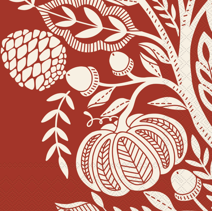 Decorative paper napkin with white pumpkins, leaves, and acorns on a red background