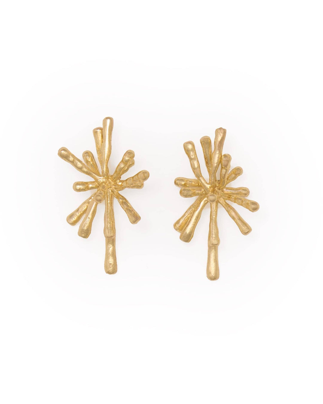 A pair of textured gold starburst stud earrings on a plain white background.