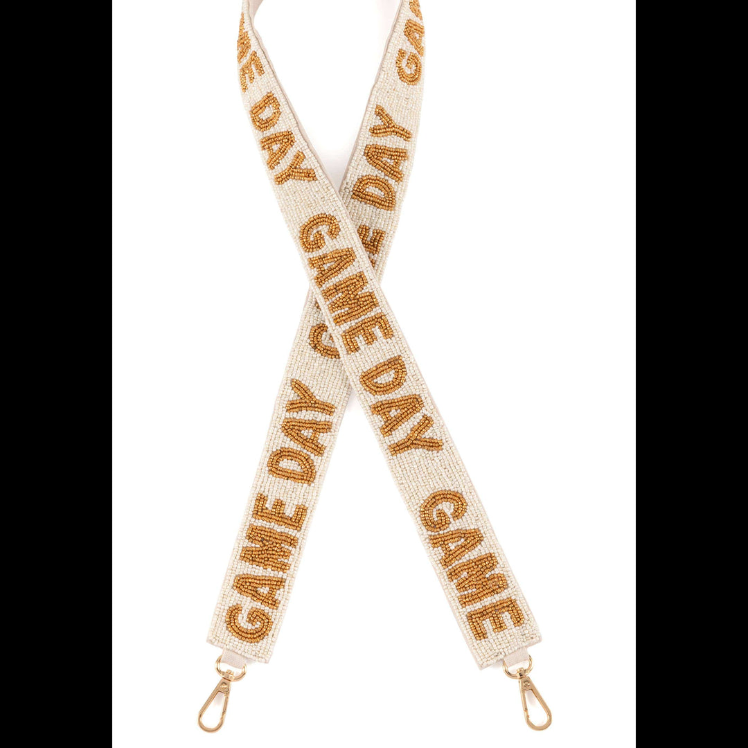 Beaded purse strap with 'Game Day' text on a white background