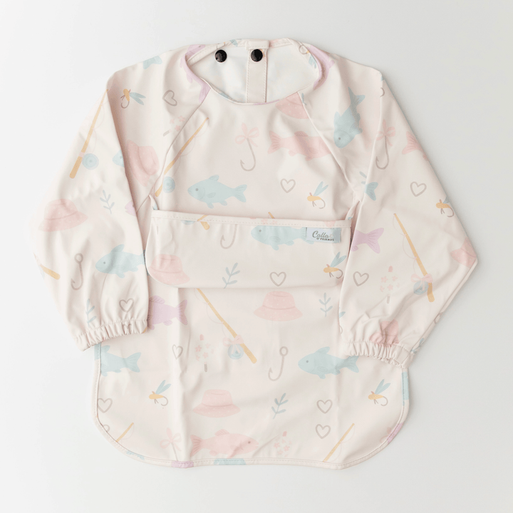 light pink long sleeved bib with fish and fishing gear pattern