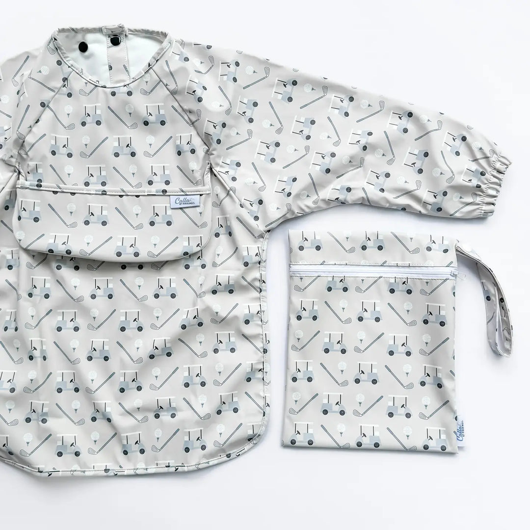 Set of baby bib and pouch with geometric pattern on a white background