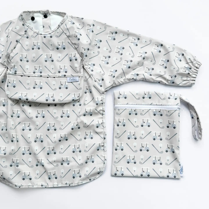 Set of baby bib and pouch with geometric pattern on a white background