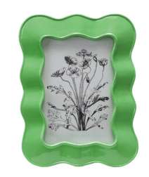 Green picture frame with a floral design on a white background