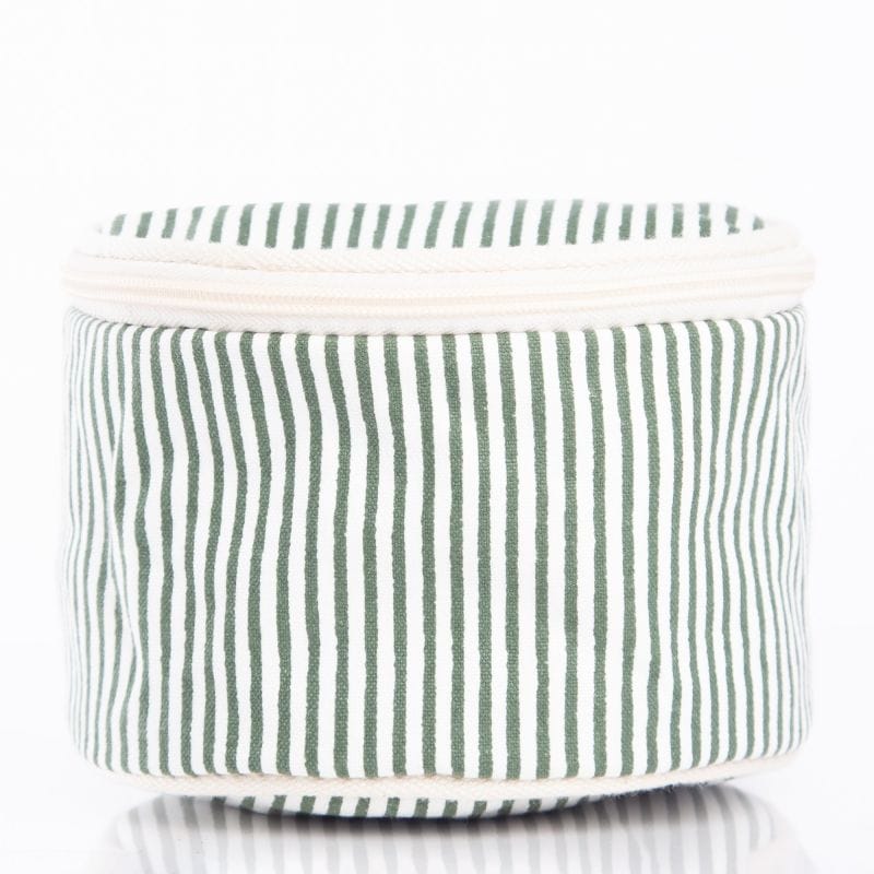 Striped fabric basket with green and white stripes on a white background