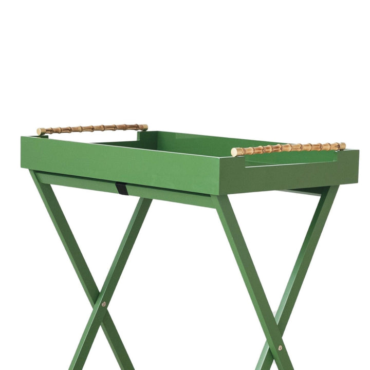 Green metal tray table with wooden handles on a white background