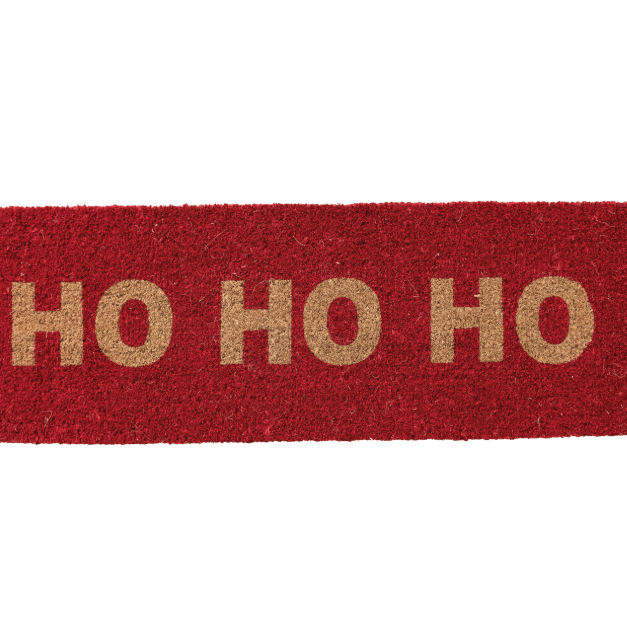 A rectangular red coir doormat with the words 'HO HO HO' printed across the top in a natural tan coir lettering, shown against a plain white background.