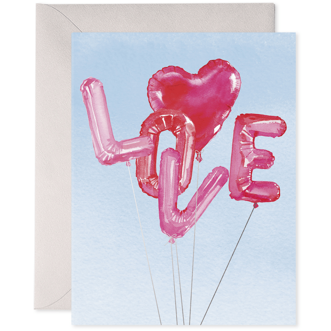 Greeting card with pink 'LOVE' balloons on a light blue background