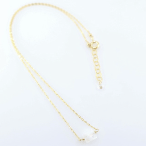 Single faceted rectangular moonstone on 14K gold filled chain on white background