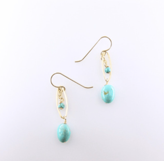 Turquoise earrings with gold hooks on a white background