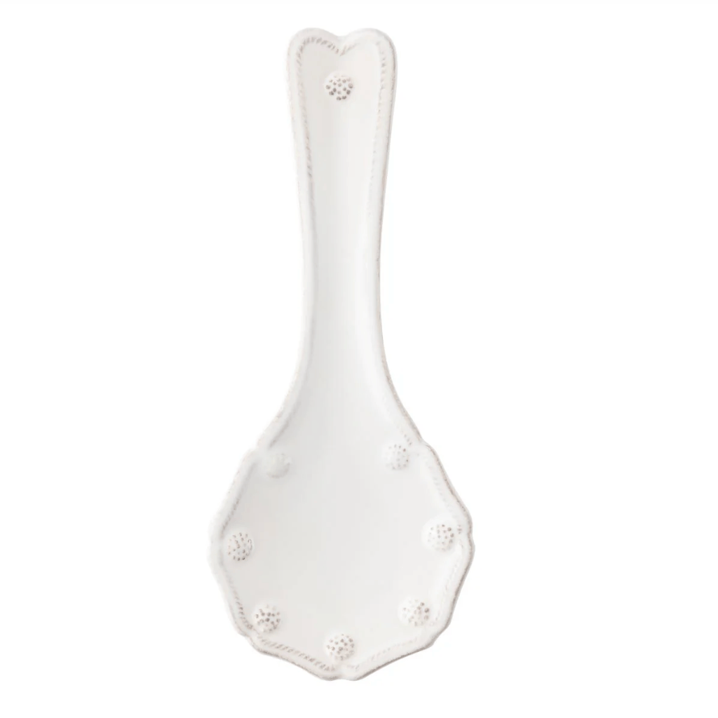 white ceramic patterned spoon rest