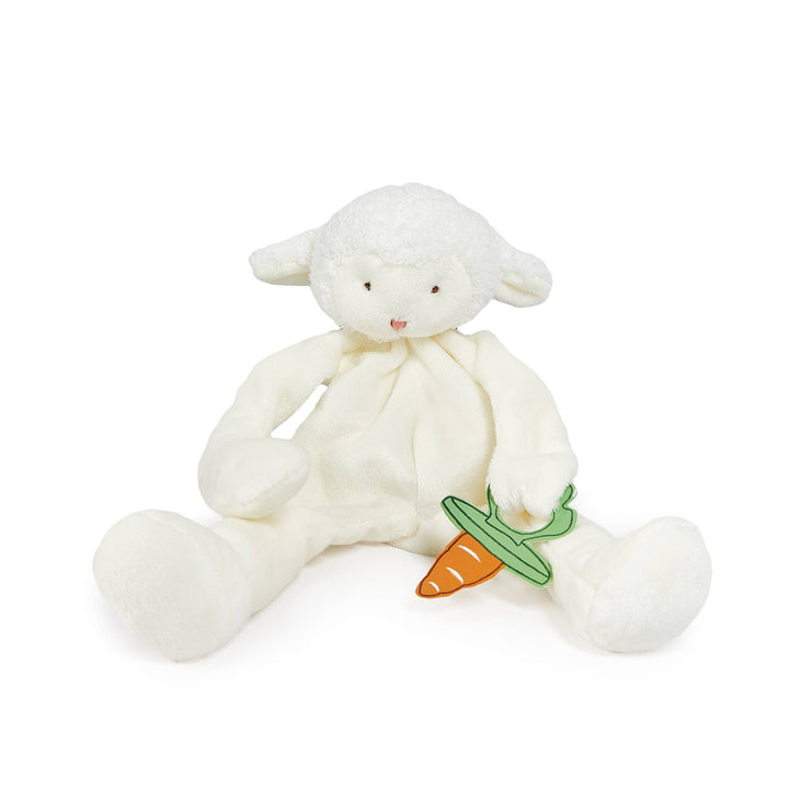 White plush lamb lovey and pacifier holder with a carrot on a white background