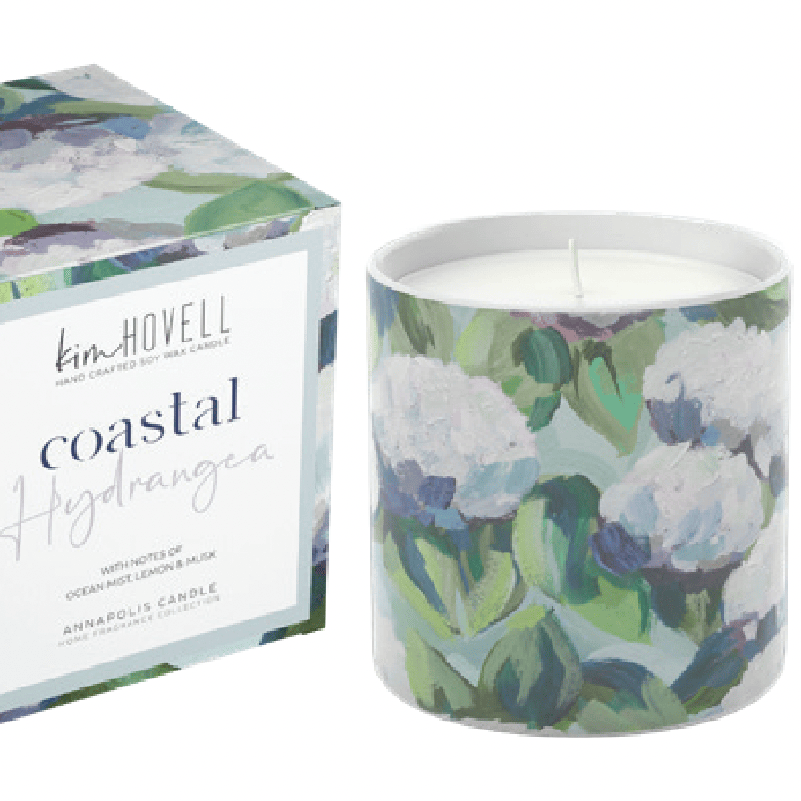 Candle and packaging with floral design and 'kim howell' branding