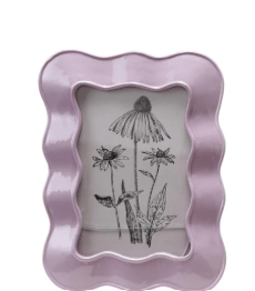 Lavender wavy frame with black floral design on a white background