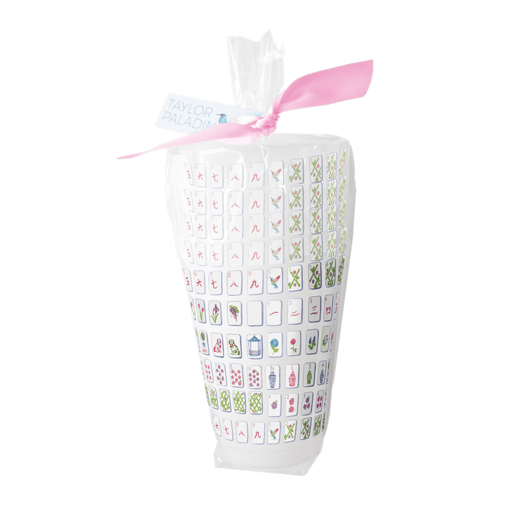 Package of white frosted drinking cups with mahjong tiles tied with a pink ribbon on a transparent background