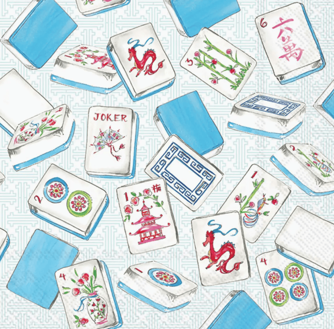 Collection of colorful Mahjong tiles on a textured surface