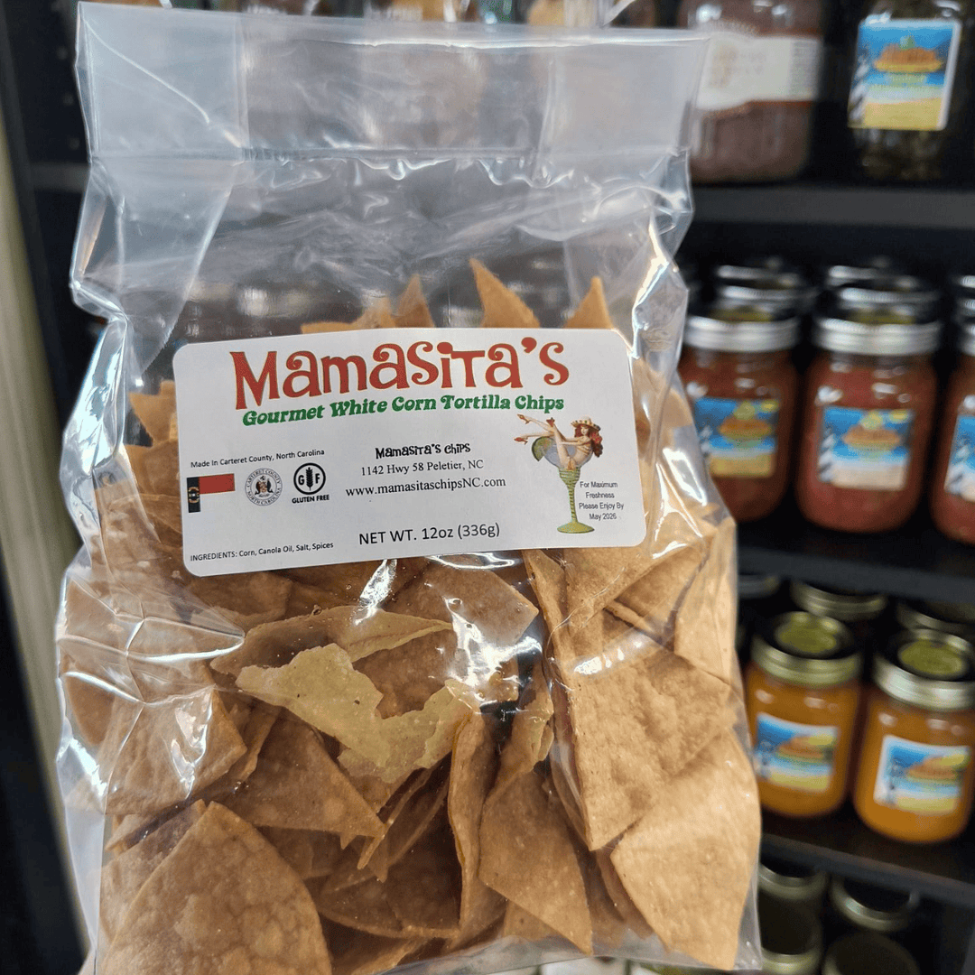 Bag of Mamasita's tortilla chips with jars in the background