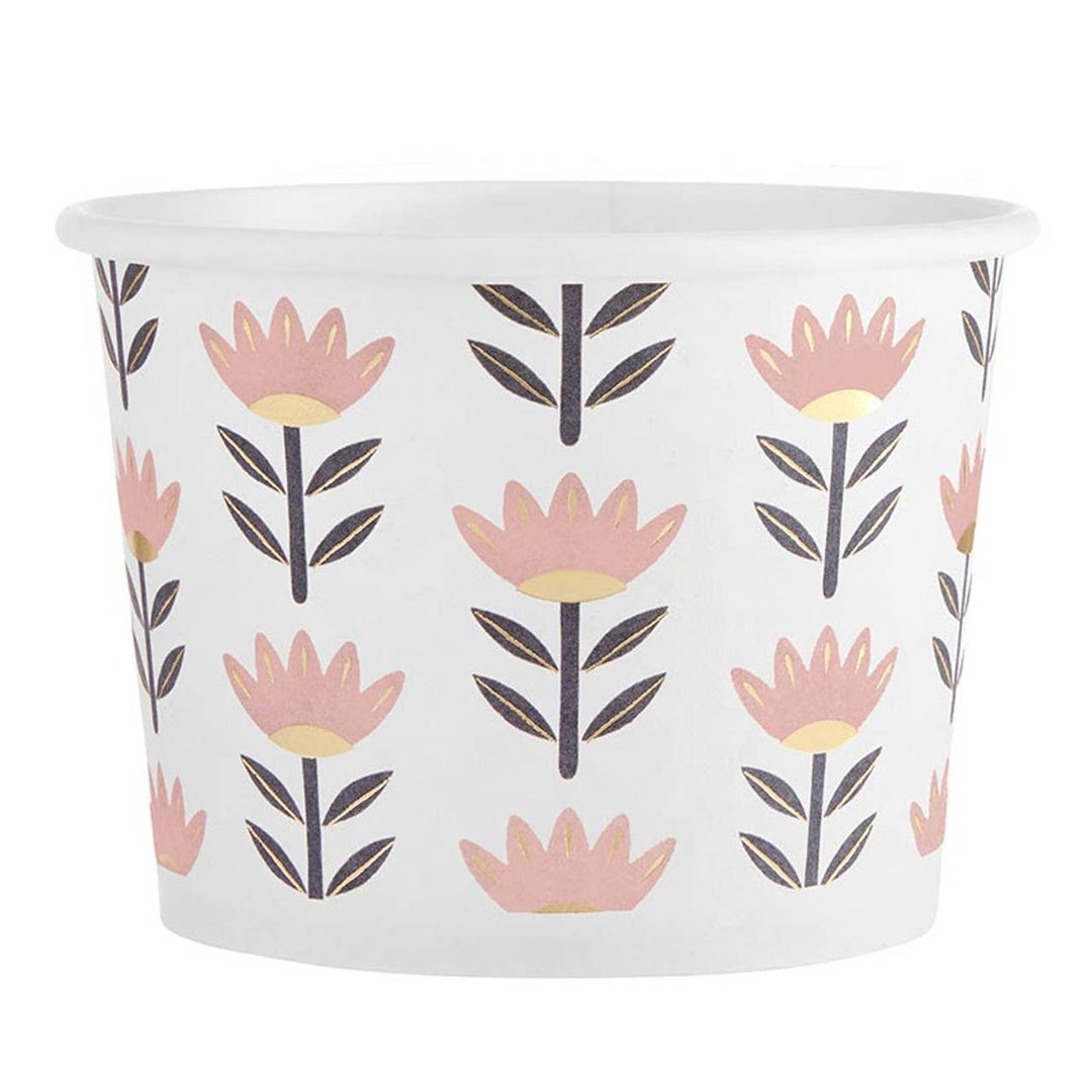 White container with pink floral pattern on a white background