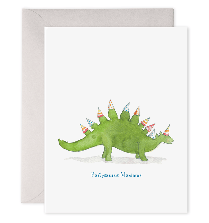 Greeting card with a green dinosaur wearing party hats on a white background