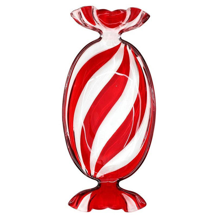 A red and white striped glass vase shaped like a wrapped candy, isolated on a white background.