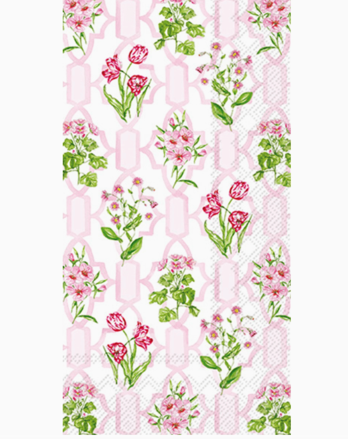Paper guest towel with pink floral design and text on a white background