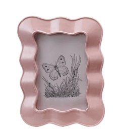 Pink wavy frame with butterfly design on a white background