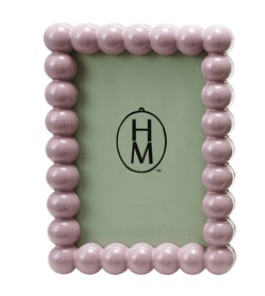 Pink hobnail photo frame with pink bead border on a white background