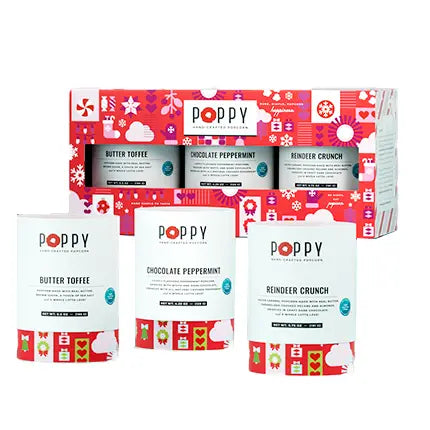 Poppy tea packaging with various flavors in a decorative box on a white background