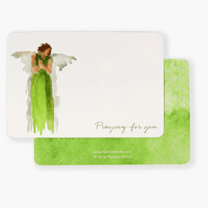 Card with a green angel illustration and 'Praying for you' text on a white background