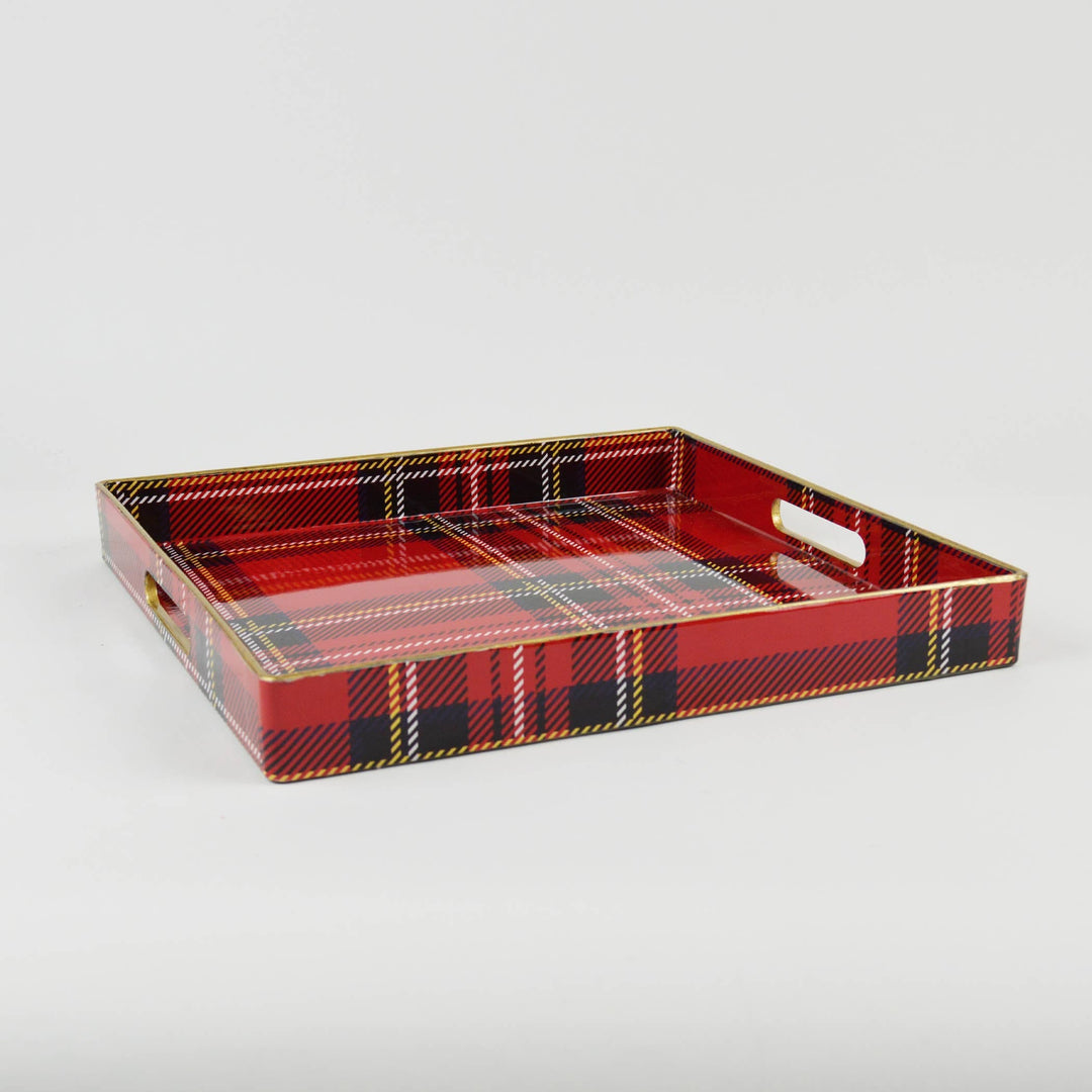 A square serving tray with a red, black, and gold tartan plaid pattern, featuring two white handles on the sides, shown on a light gray background.